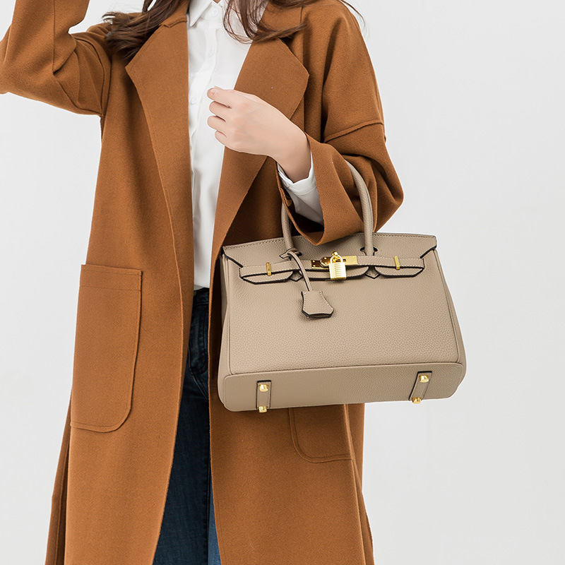 氣質高級感輕奢手壓荔枝紋凱莉包女包手提斜背側背包